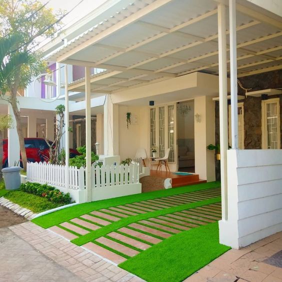 Jasa pasang kanopi rumah minimalis dipadukan rumput
